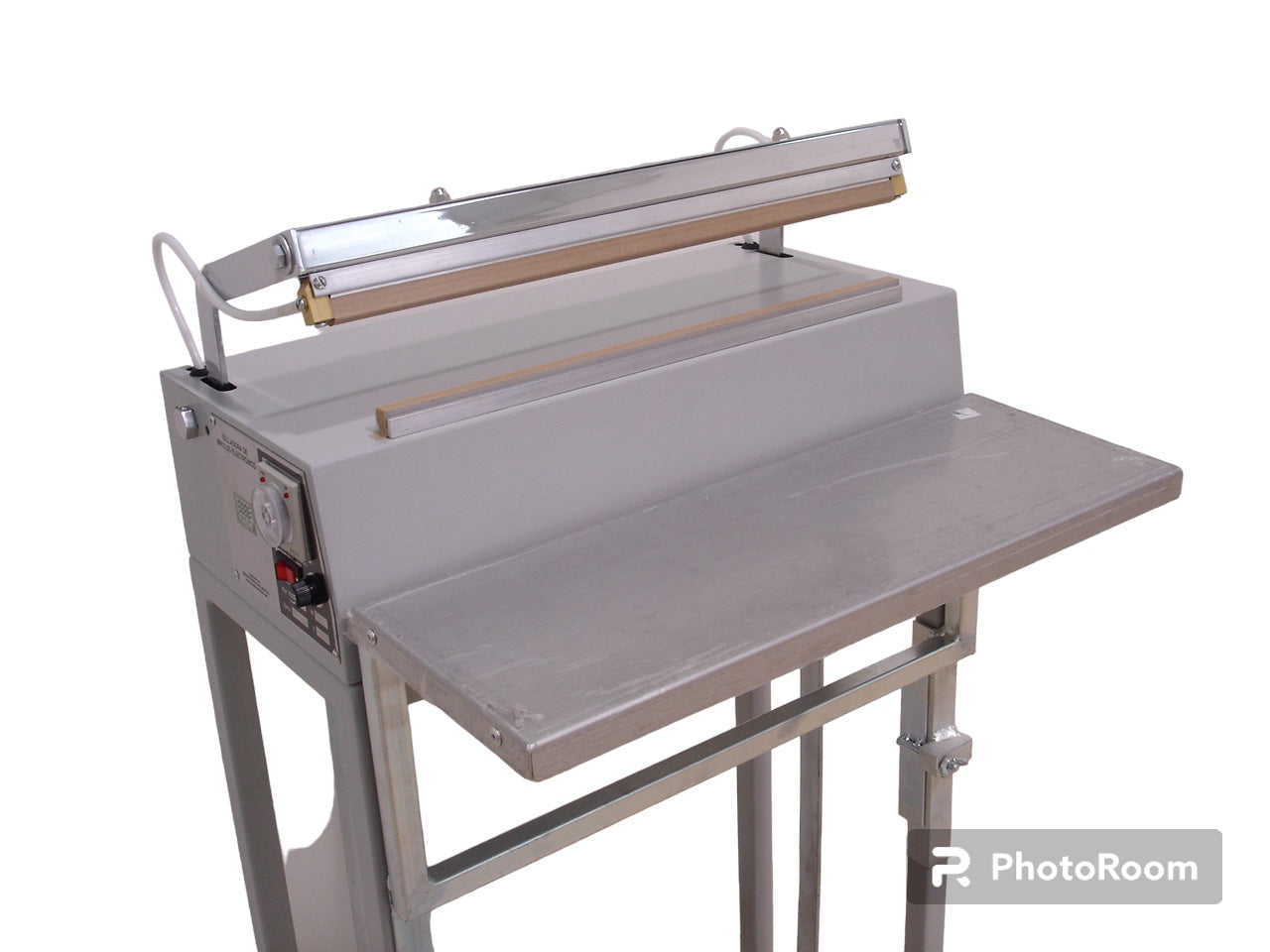 Selladora de impulso electrónico de pedal, 5.5 mm x 38 cm, horizontal, color beige. Marca THOR Imagen principal del producto